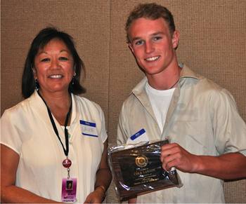 Pricipal Laurie Fong with student Cole Larson
