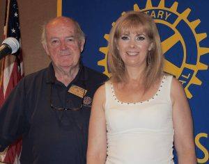 Rotarian Jack Geary presented a Blue Badge to his daughter Andrea Geary. Two generations of Rotarians in the same club!