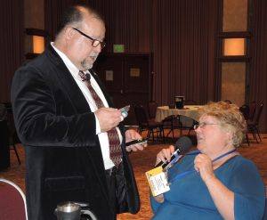 Jose recognizes Jeanne Levin with a new badge, since she put her “old” badge through the wash! 